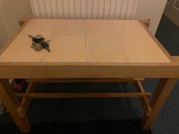 Cream tiled & wooden table