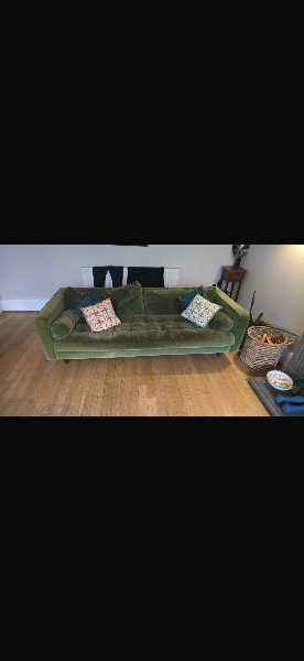 Two green sofas