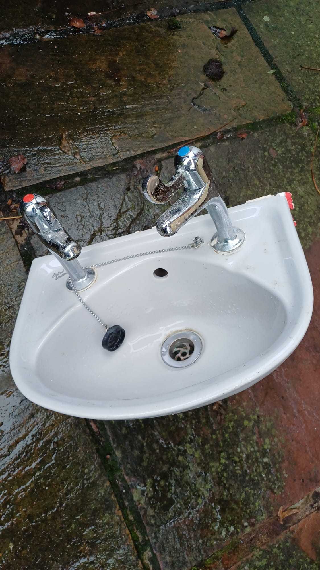 Grey toilet and basin