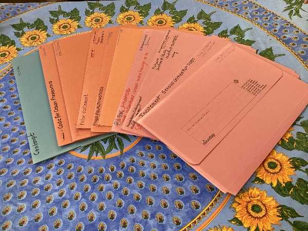 Box files, folders, paper,  pens and tags