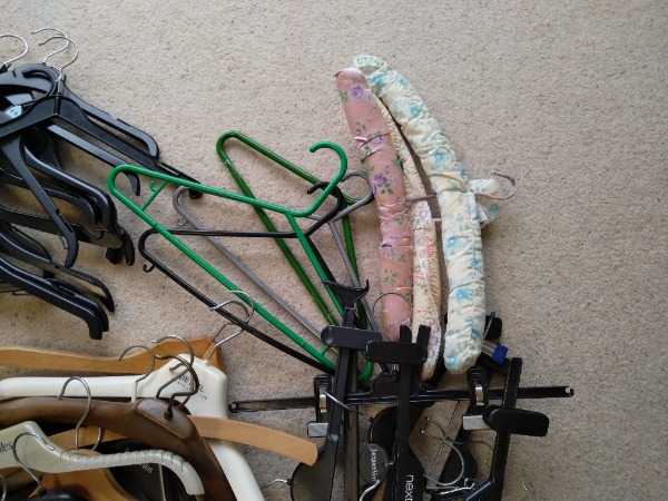 59 clothes hangers, various types
