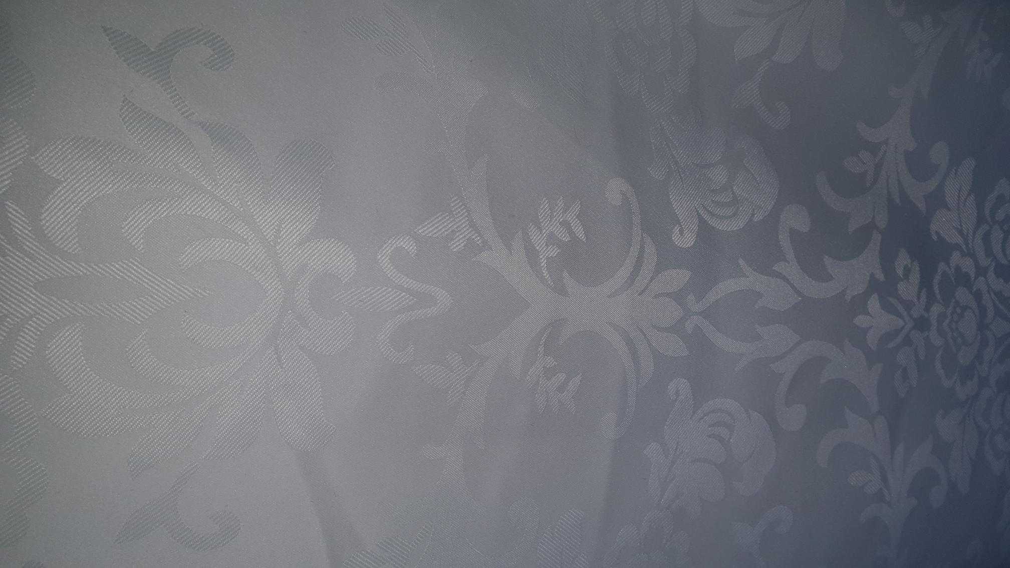 Pair of ivory patterned curtains